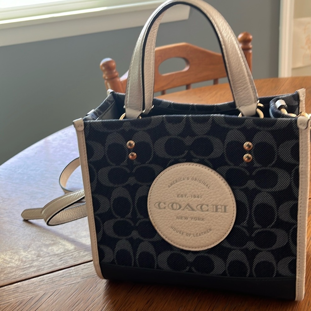 Beautiful blue and cream Coach bag.